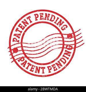 PATENT PENDING red grungy round postal stamp. Stock Photo