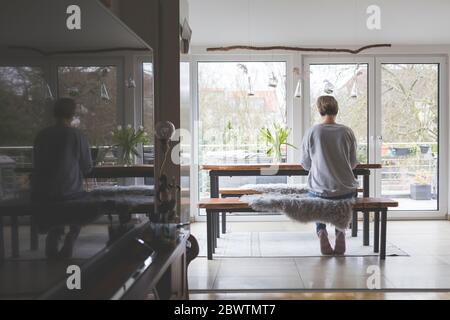 Mature woman working from home, rear view Stock Photo