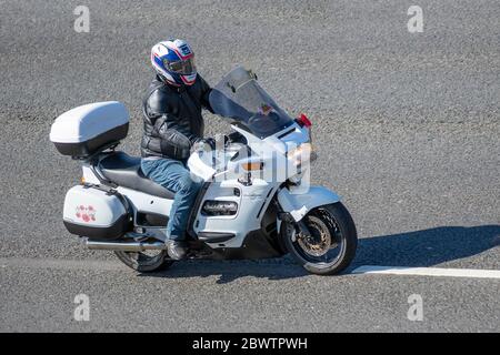 White Honda Pan-European Motorbike rider; two wheeled transport, motorcycles, vehicle, roads, motorbikes, bike riders motoring on the M6 motorway Chorley, UK Stock Photo