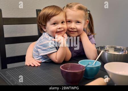 Portrait of happy siblings head to head Stock Photo