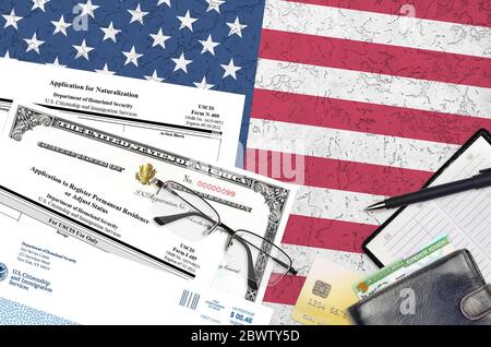 USCIS form I-485 Application to register permanent residence or adjust status and N-400 Application for naturalization with Certificate of naturalizat Stock Photo