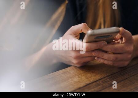 Close-up of woman using smartphone Stock Photo