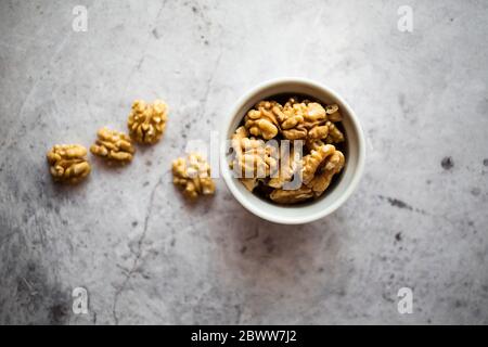 Bowl of peeled walnuts Stock Photo
