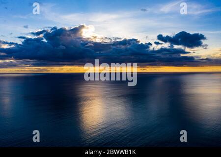 Mauritius, Helicopter view of storm clouds over Indian Ocean at sunset Stock Photo