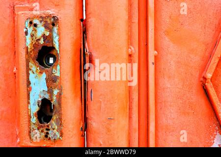 Broken Knob on Red Door. Stock Photo
