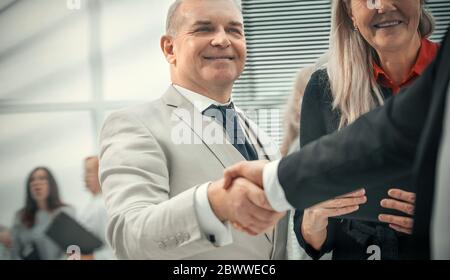 close up. handshake of business people in a modern office Stock Photo
