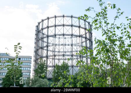 Berlin, Germany. 27th Apr, 2020. The low-pressure gas tank on the former GASAG site in Berlin-Schöneberg. In 1913, the Schöneberg gasometer was put into operation and shut down in 1995. The 78-meter-high listed building is a prominent landmark in Schöneberg on the EUREF campus in the Red Island district. Credit: Georg Wenzel/dpa-Zentralbild/ZB/dpa/Alamy Live News Stock Photo