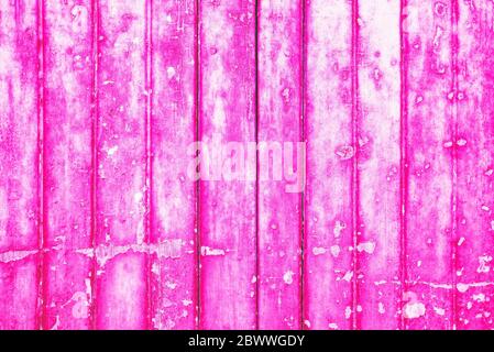 Old Grunge Wooden Fence in Plastic Pink Tone or Deep Pink Color Background, That is a 2019 World's Most Popular Color. Stock Photo
