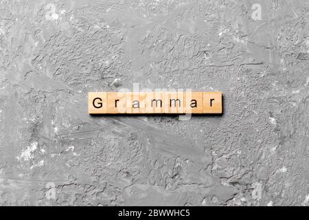 grammar word written on wood block. grammar text on table, concept. Stock Photo