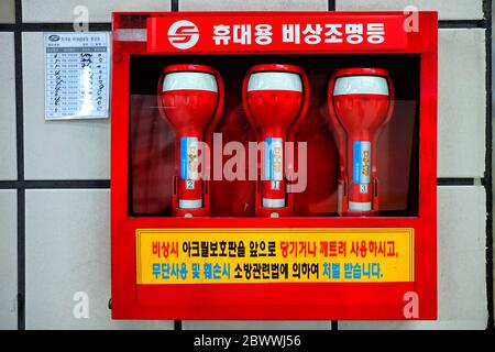 SEOUL, SOUTH KOREA - DECEMBER 26, 2018: Electric flashlight torch at a Seoul subway station for using in emergency case. Stock Photo