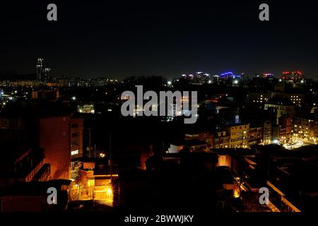 SEOUL, SOUTH KOREA - DECEMBER 28, 2018: Scenery of cityscape night at Itaewon-dong area where is known for a famous dining and nightlife in Seoul, Sou Stock Photo