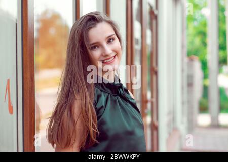 Close-up portrait of a happy beautiful blonde hair girl. Wonderful smiling woman with lovely look bright make up. Natural young beauty. horizontal sho Stock Photo