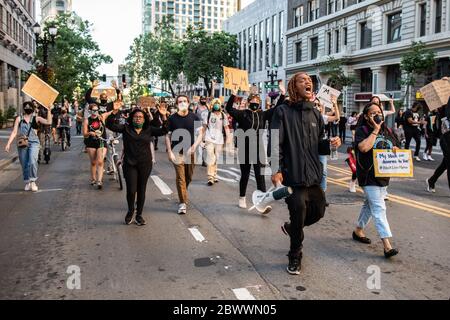 Oakland, Ca. 2nd June, 2020. Protestors march through Oakland, California on June 2, 2020 after the death of George Floyd. Credit: Chris Tuite/Image Space/Media Punch/Alamy Live News Stock Photo