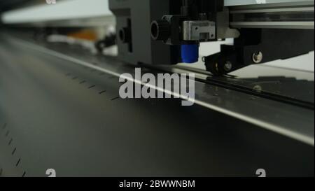 Industrial worker input data programing for CNC milling machine. Stock Photo