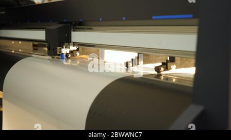 Industrial worker input data programing for CNC milling machine. Stock Photo