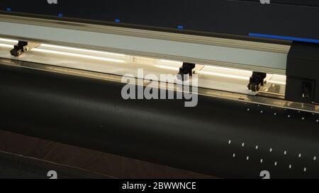Industrial worker input data programing for CNC milling machine. Stock Photo