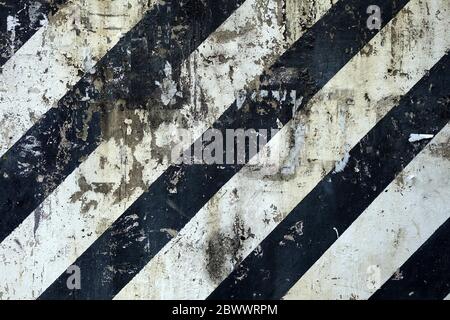 Black and White No Parking Striped Line on Old Concrete Wall Background. Stock Photo