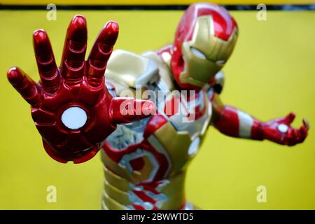 BANGKOK, THAILAND - APRIL 25, 2019: Close up Hand of Iron Man Model, Iron Man is a famous character in Avenger Animation that Created by Stan Lee. Stock Photo