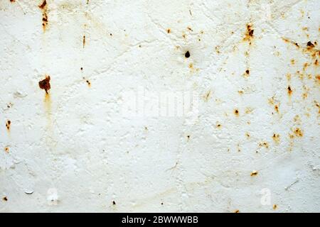 White Peeling Paint and Rusty on Metal Background. Stock Photo