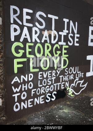 Glasgow, UK, 3rd June 2020. Memorial to George Floyd, the African-American man killed in Minneapolis, Minnesota, USA, by officers of the Minneapolis Police Department, written on a wall beside the River Clyde, in Glasgow, Scotland, on 3 June 2020. Photo credit: Jeremy Sutton-Hibbert/Alamy Live News. Stock Photo