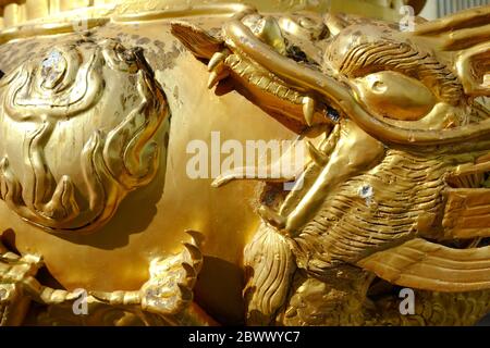 Close up Old Golden Dragon Incense Burner. Stock Photo