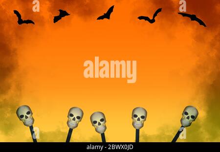 Five Halloween skulls on sticks with five bats and dark cloud border, on an orange background Stock Photo