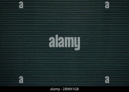 Old Black Folding Metal Door Texture Background. Stock Photo