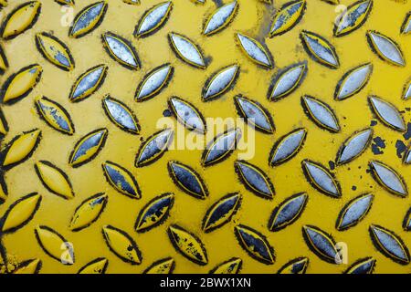Close up Old Yellow Diamond Metal Plate. Stock Photo