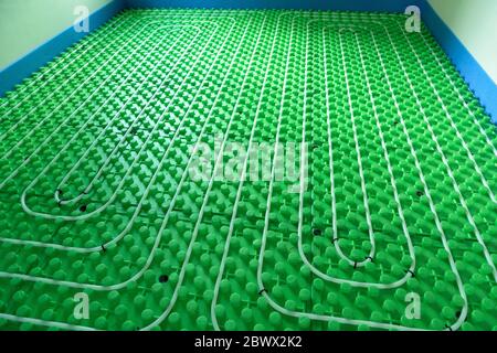 Hole room floor heating system - hydro installation with pipes Stock Photo