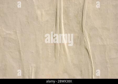 Blank brown beige creased crumpled paper texture background old grunge ripped torn vintage collage posters placard Stock Photo