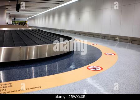 SAPPORO, JAPAN - NOVEMBER 09, 2019: Luggage conveyor belt at New Chitose airport where is the largest airport in Hokkaido, Japan. Stock Photo