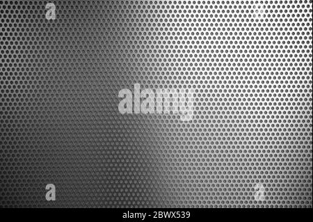 White Punched Metal Sheet Wall Texture Background. Stock Photo