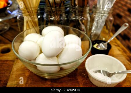Close up White Boiled Eggs in Glass Bowl for Breakfast. Stock Photo
