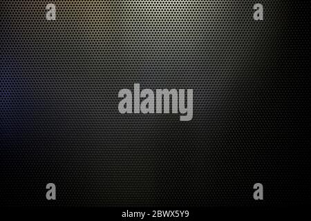Black Punched Metal Sheet Wall Texture Background. Stock Photo