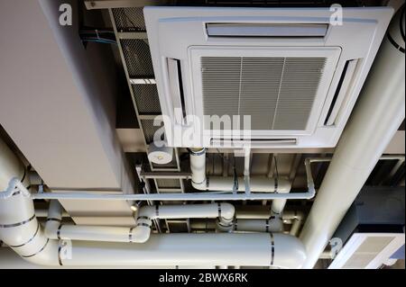 Close up Air Conditioner System on the Ceiling. Stock Photo