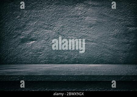 Abstract Concrete Table with Old Ground Concrete Wall Texture Background in Dark Tone, Suitable for Product Presentation, Mockup, and Backdrop. Stock Photo