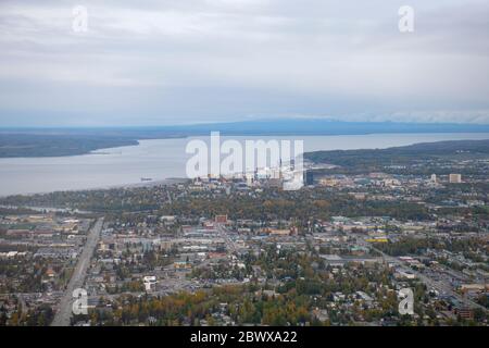 Aerial view of downtown Anchorage and Port on Knik Arm from a taking off airplane in Anchorage, Alaska, AK, USA. Stock Photo