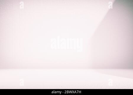 Abstract White Concrete Room Background with Beautiful Light Leak, for Product Presentation Backdrop and Mockup. Stock Photo