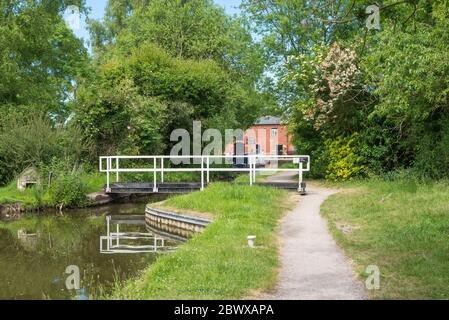 Swingbridge over the Coventry canal at Fradley Junction in Staffordshire which is at the junction of the trent and mersey canal and coventry canal Stock Photo