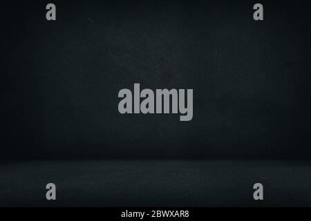 Abstract Black Rough Concrete Room Texture Background with Beautiful Light Leak, Suitable for Product Presentation, Backdrop, Mockup and Business Conc Stock Photo