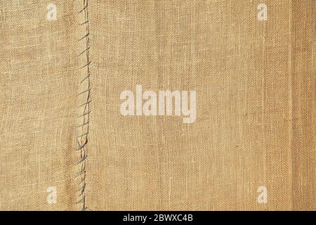 Old Brown Coarse Burlap Canvas Texture Background. Stock Photo