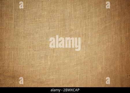 Old Brown Coarse Burlap Canvas Texture Background. Stock Photo