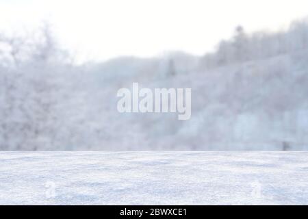 Abstract Snowy Ground with White Mountains in Winter Season Background, Suitable for Product Presentation Backdrop, Display, and Mock up. Stock Photo