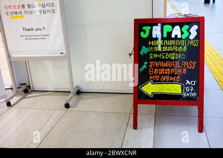 SAPPORO, JAPAN - NOVEMBER 09, 2019: JR Hokkaido Rail pass help desk sign at New Chitose Airport where is the largest airport in Hokkaido, Japan. Stock Photo