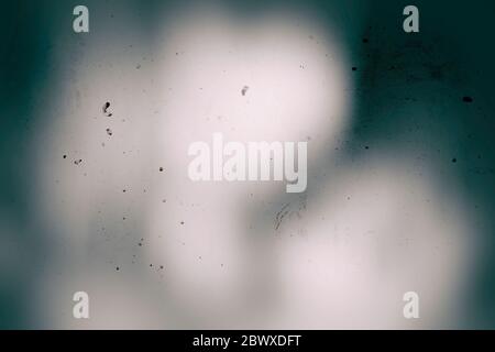 Black Film Strip Texture with Scratch and Grain Background in Phantom Blue Tone, Suitable for Overlay and Color Cast Effect. Stock Photo