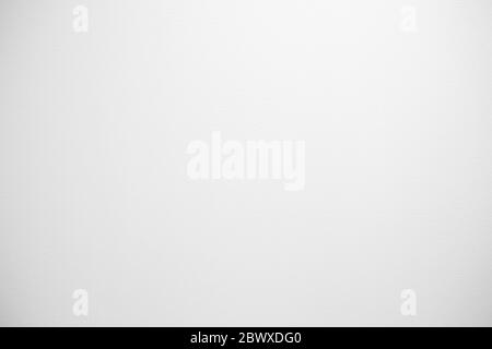 White Painting Texture on Wall in Interior Room Background with Light Leak on the Top, Suitable for Backdrop and Mockup. Stock Photo