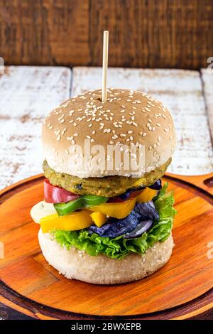 Vegetarian burger, Sandwich made without meat. It can be made from corn, potatoes, textured soy protein, legumes, tofu, mushrooms or cereals.