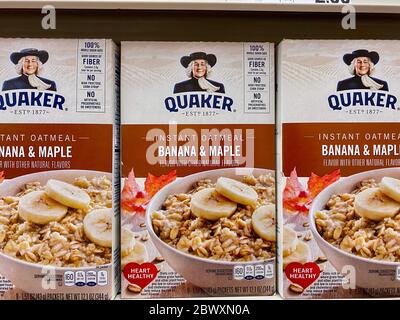 Quaker instant oatmeal boxes on a store shelf Stock Photo