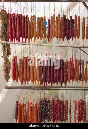 Caucasian national sweet delicacies - churchkhela, pastila, and spices Stock Photo