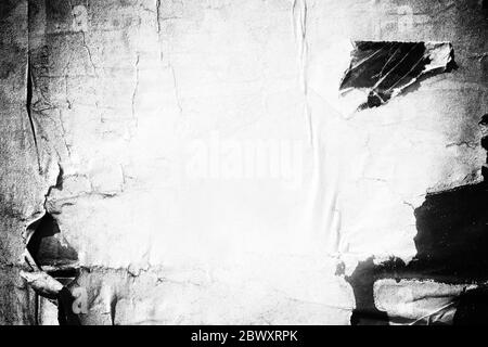 Old blank ripped torn posters textures backgrounds grunge creased crumpled paper vintage collage placards empty space for text backdrop surface Stock Photo